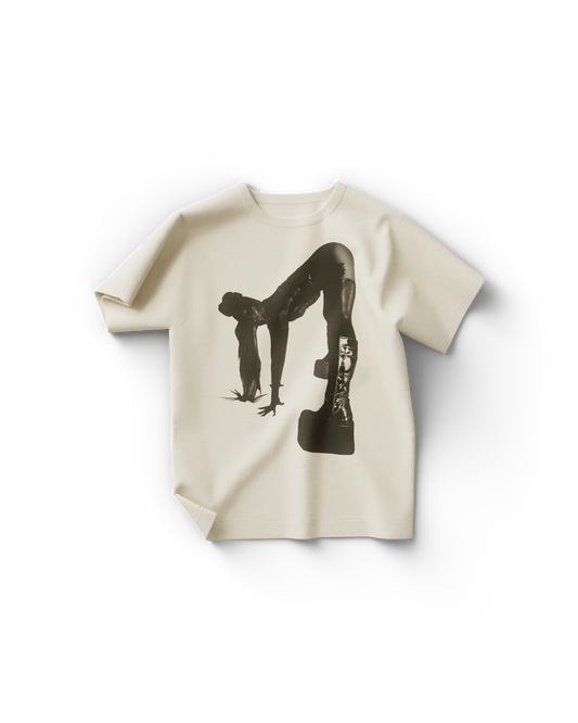 Cream Lady Gaga t-shirt with black silhouette photo of Gaga in platform boots and bent pose from Chromatica era

