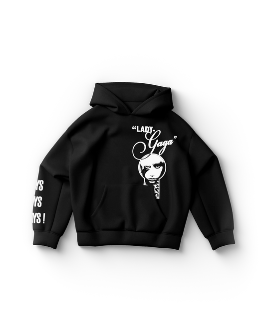 Black hoodie with white “Lady Gaga” keyhole portrait graphic on chest and “BOYS BOYS BOYS!” text down right sleeve

