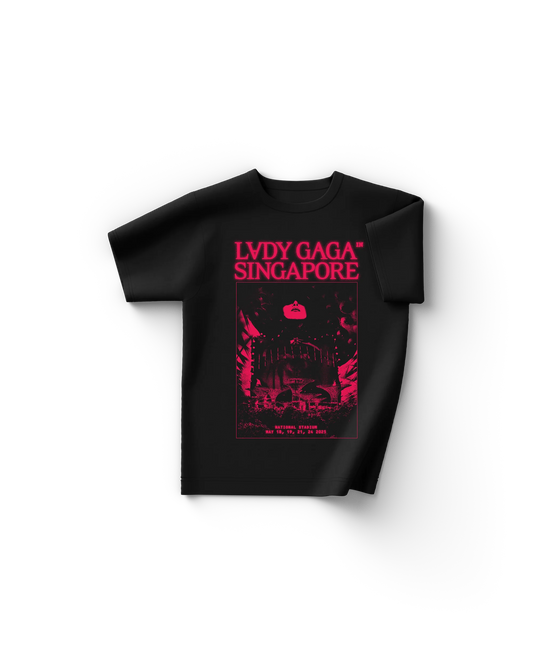 Black Lady Gaga t-shirt featuring red-magenta concert artwork with Gaga’s face above Singapore’s National Stadium, and “LADY GAGA™ SINGAPORE” text at the top. Includes 2025 tour dates at the bottom in the same hot pink tone.

