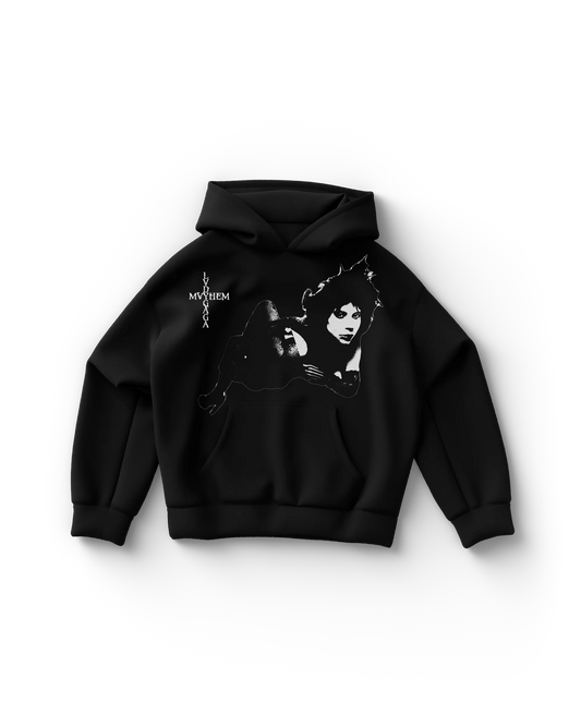 Black Lady Gaga hoodie with a high-contrast graphic of Gaga reclining in a dramatic black-and-white silhouette, alongside vertical “LADY GAGA MAYHEM” text. A bold design that echoes horror and haute couture.

