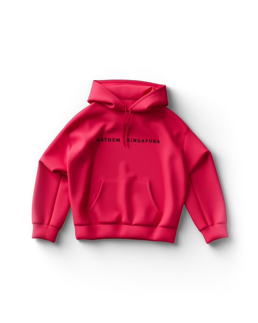 Hot pink Lady Gaga hoodie featuring minimalist black text that reads “MAYHEM SINGAPURA” across the chest. The clean, cropped design makes a bold statement while nodding to Gaga’s exclusive Singapore tour style.

